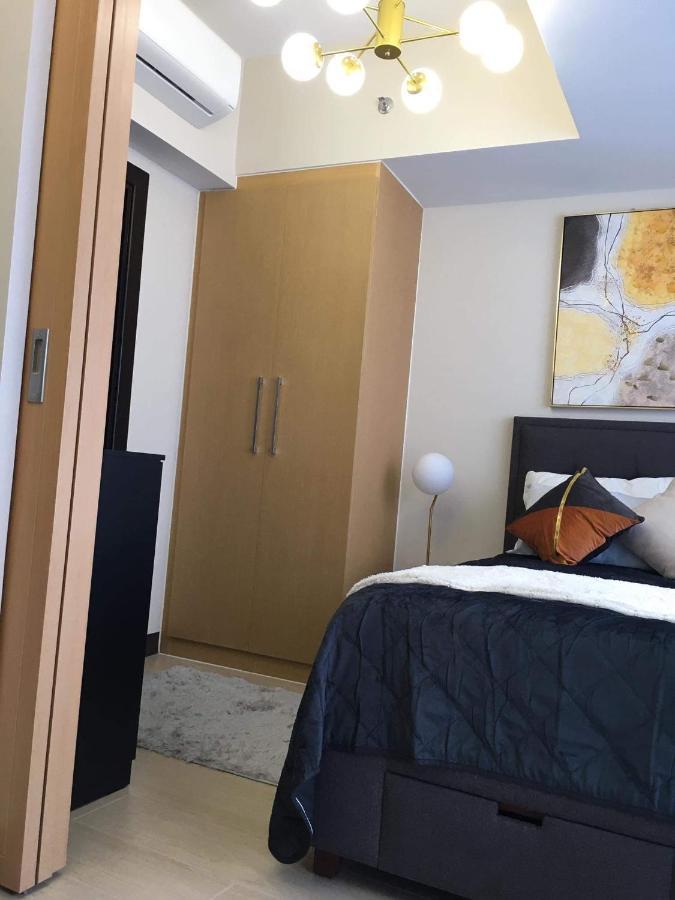 Daniella'S Modern & Cozy Suite In Uptown Bgc Манила Экстерьер фото