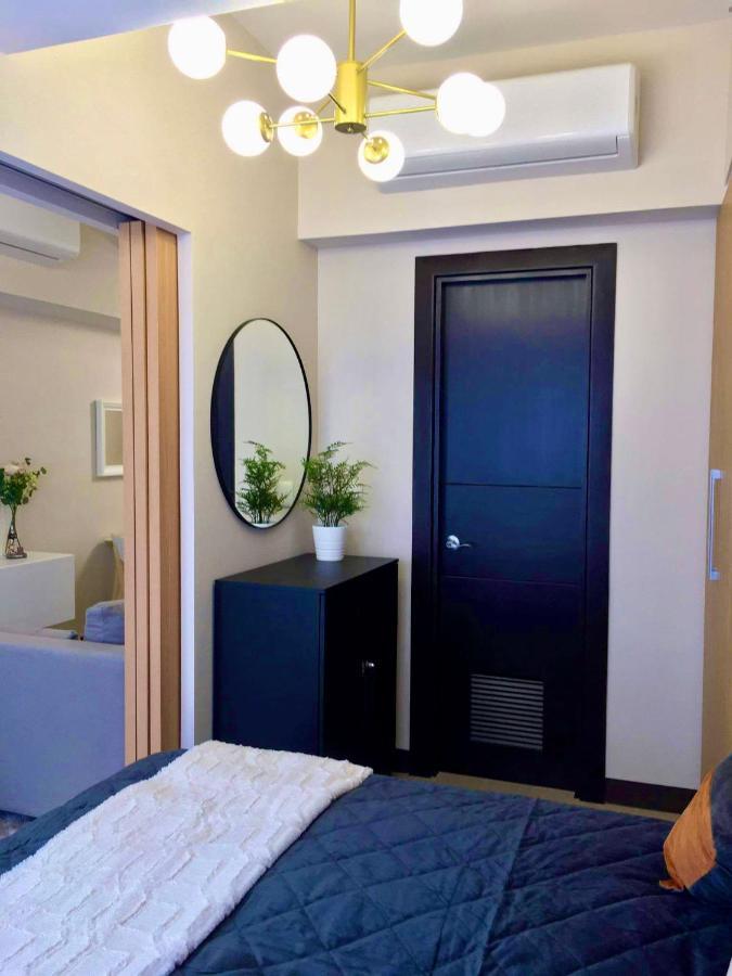 Daniella'S Modern & Cozy Suite In Uptown Bgc Манила Экстерьер фото