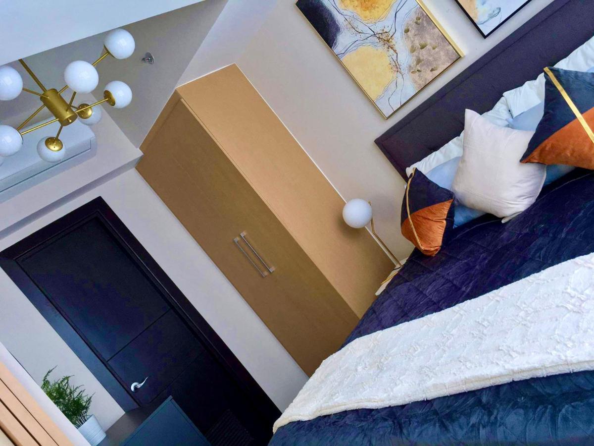 Daniella'S Modern & Cozy Suite In Uptown Bgc Манила Экстерьер фото