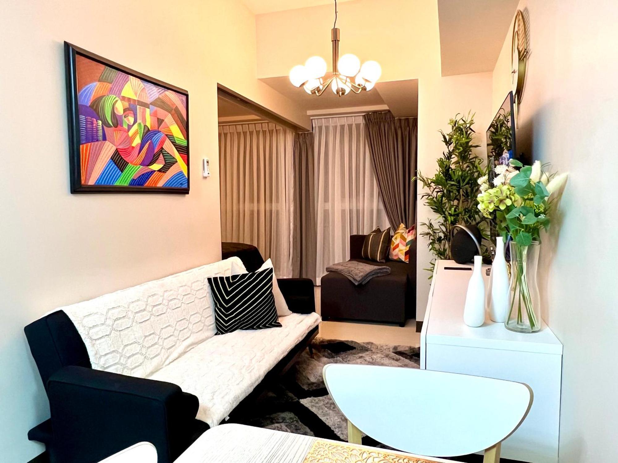 Daniella'S Modern & Cozy Suite In Uptown Bgc Манила Экстерьер фото